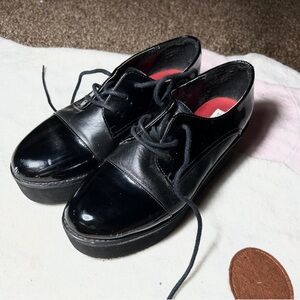 black leather platform loafers